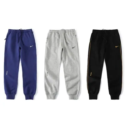 Three jogger sweatpants in royal blue, heather grey and black
