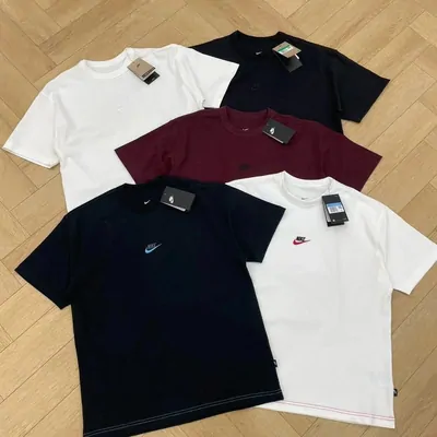 Stacked plain tees in white, black and burgundy with small chest logos
